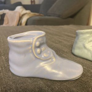 Two ceramic shoes one old stamped USA